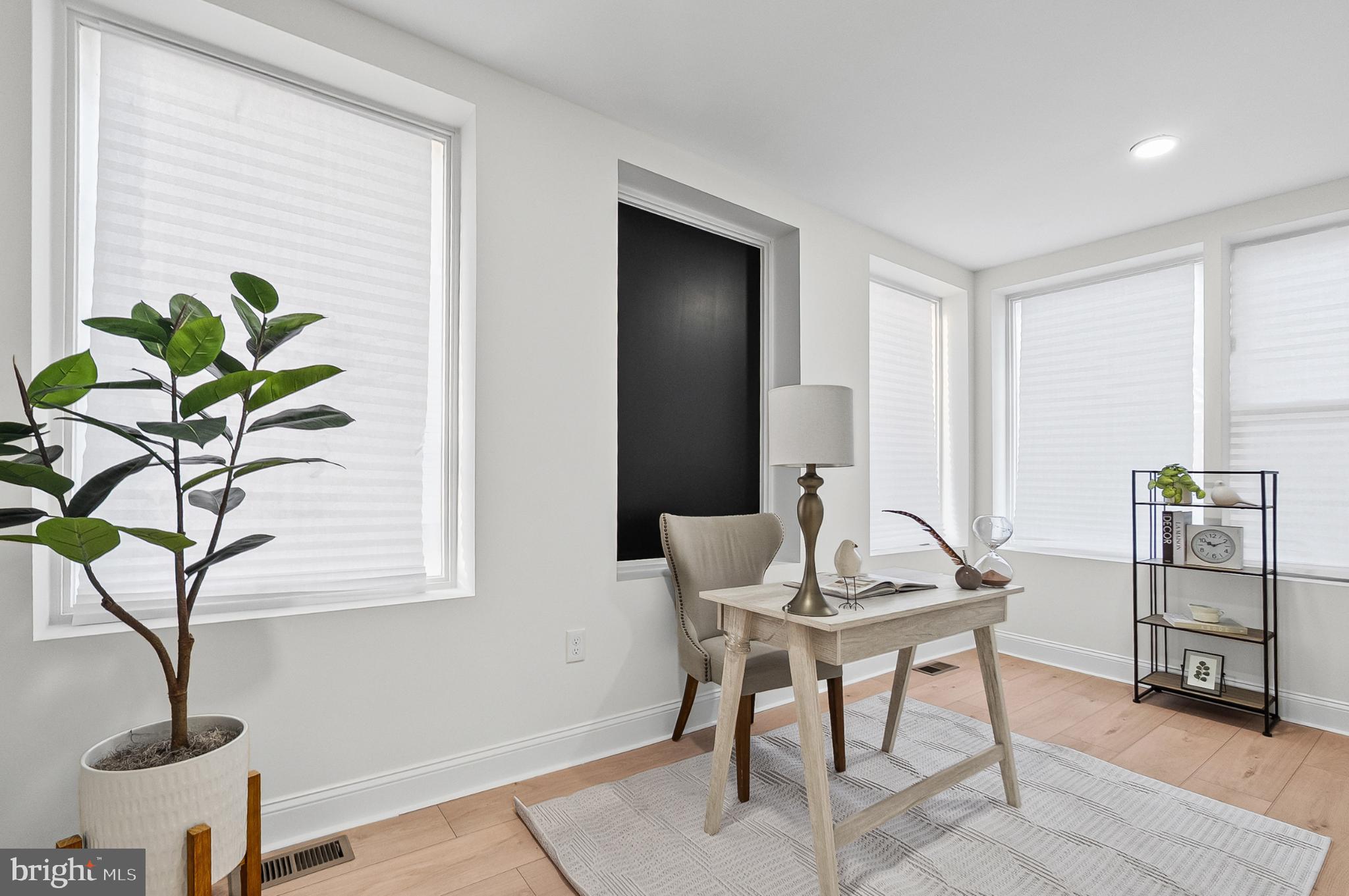 3703 Egerton Road Baltimore, MD 21215 - Photo 5 of 32 a living room with furniture
