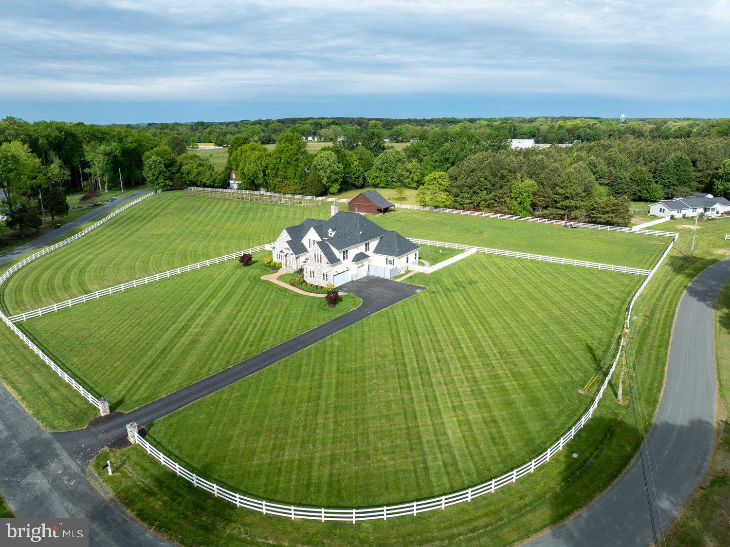 313 Wye Road Queenstown, MD 21658 - Photo 12 of 132 Sprawling estate with lush green lawns.