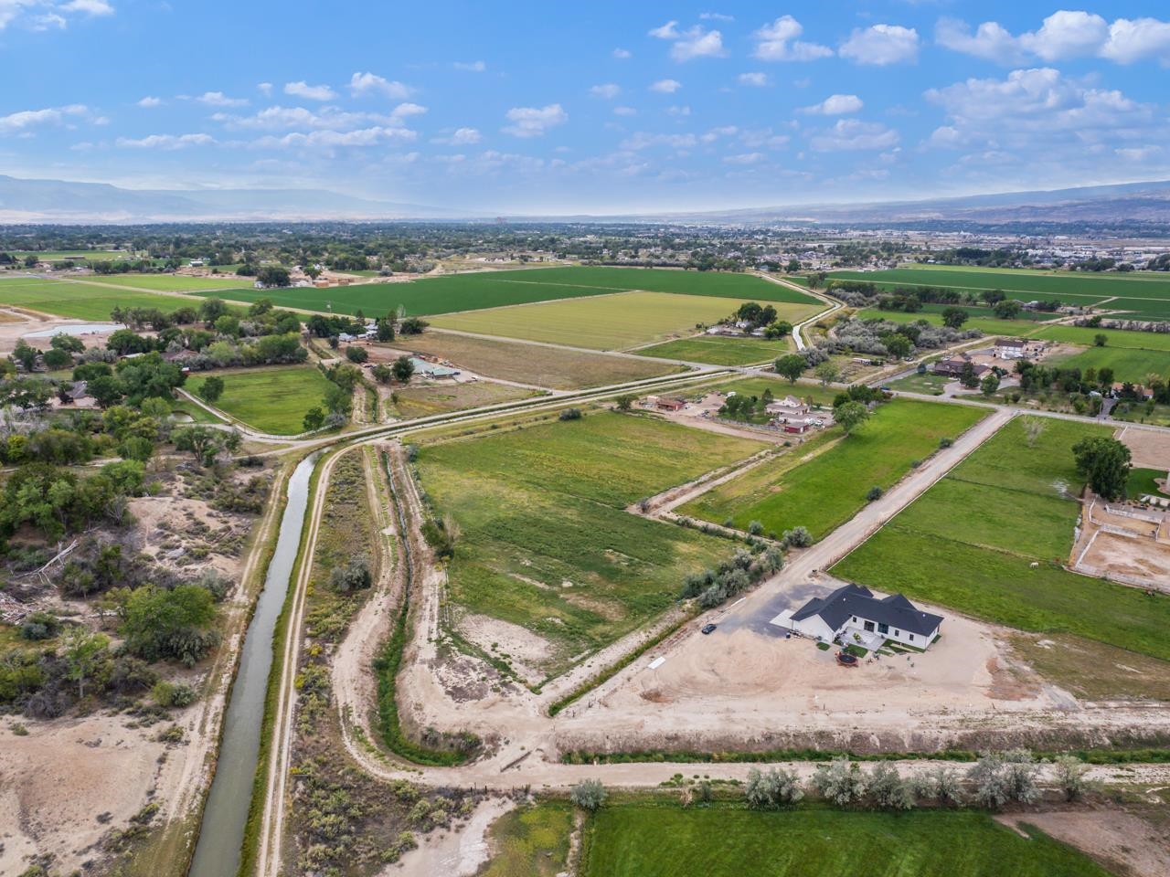 2324 I Road Grand Junction, CO 81505 - Photo 6 of 11 a view of a water with a mountain in the background