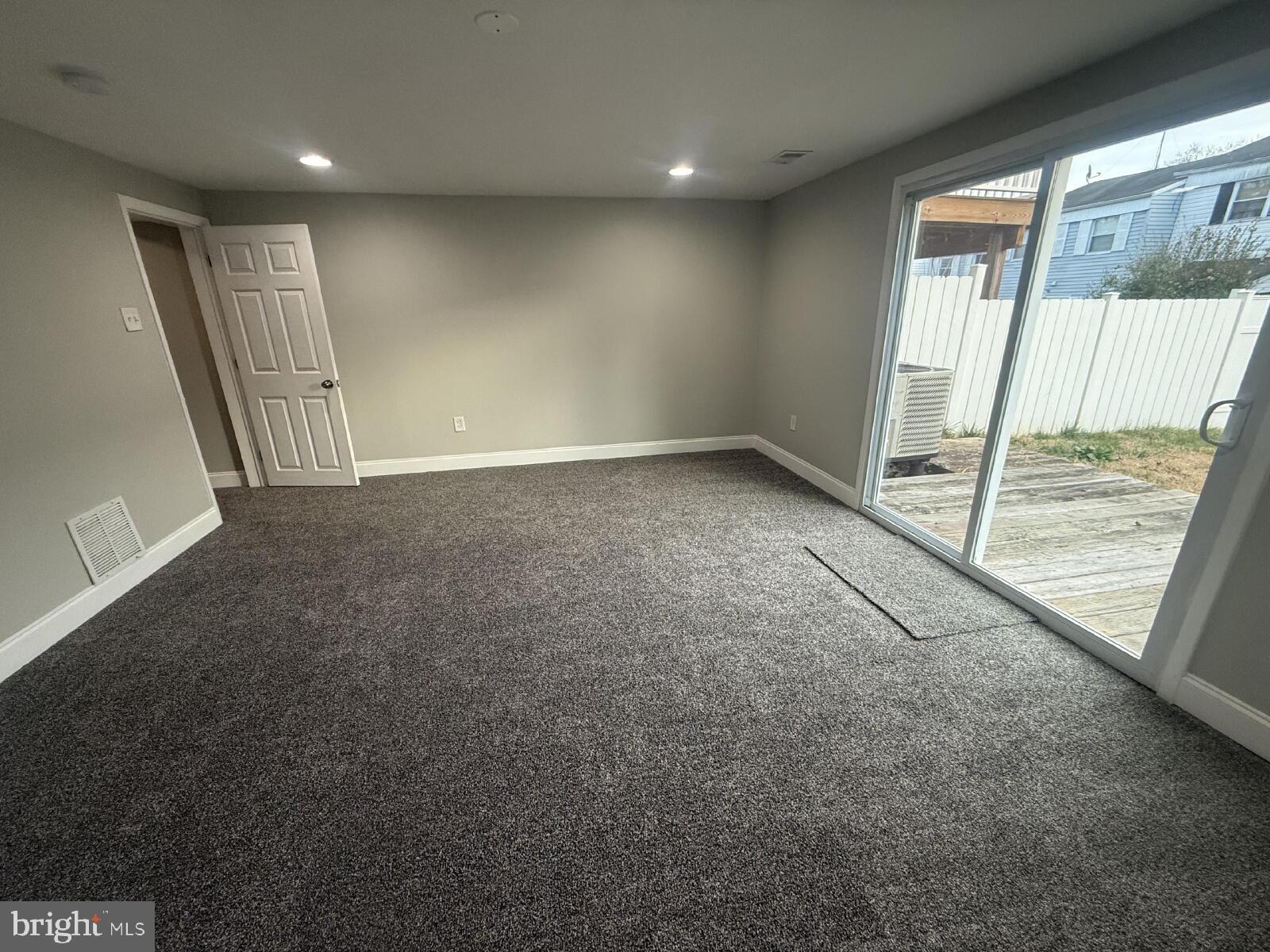 5 Bohn Court Rosedale, MD 21237 - Photo 10 of 14 a view of an empty room with a window