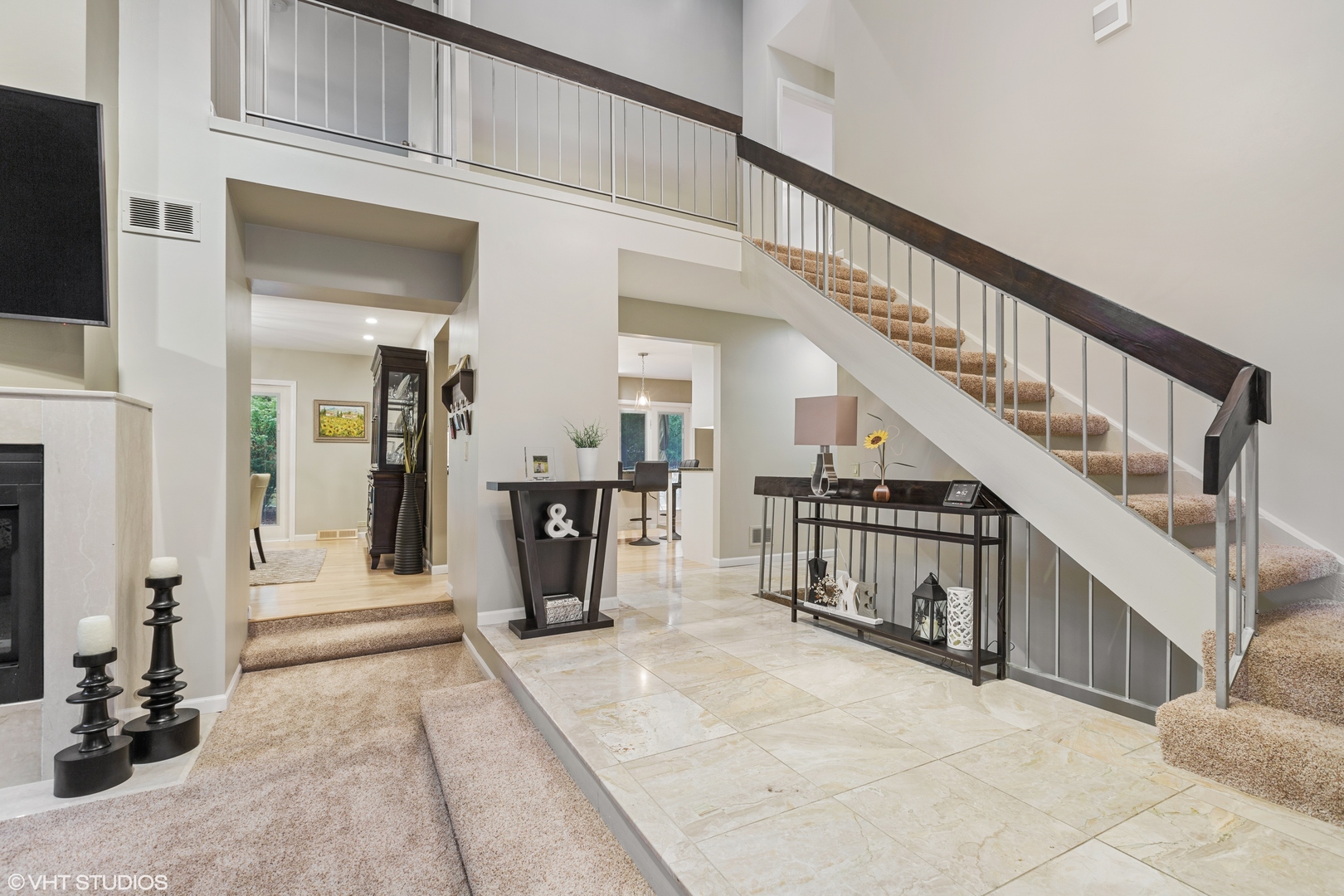 8460 Clynderven Road Burr Ridge, IL 60527 - Photo 4 of 27 a view of an entryway with dining room and stairs