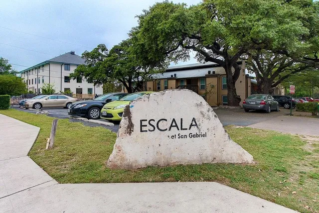 a view of backyard with a garden and entertaining space