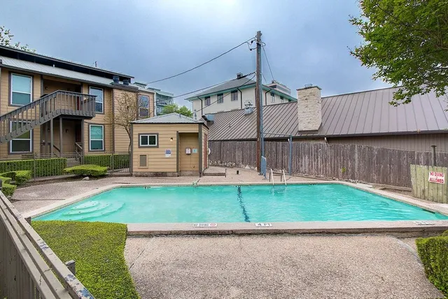 a view of a back yard of the house