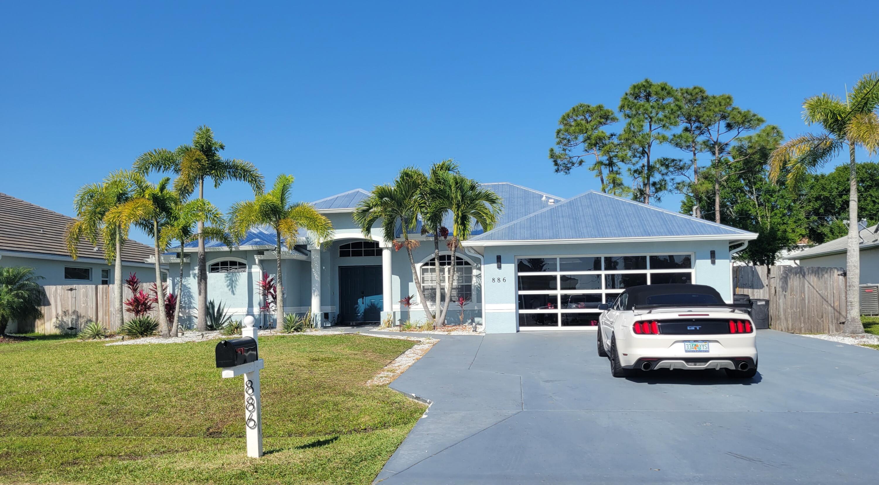 886 Southwest Curtis Street Port St. Lucie, FL 34983 - Photo 3 of 69 8-car Driveway