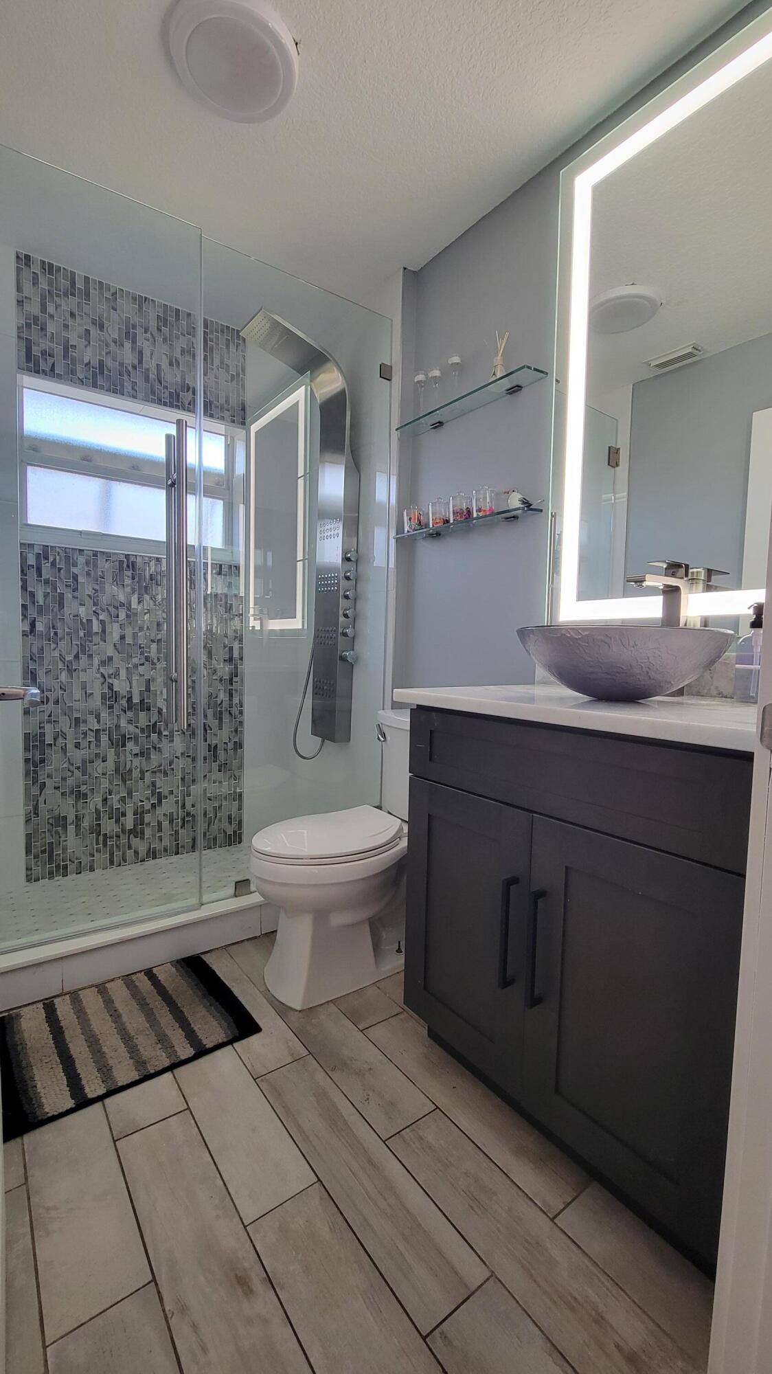 886 Southwest Curtis Street Port St. Lucie, FL 34983 - Photo 58 of 69 Guest Bathroom