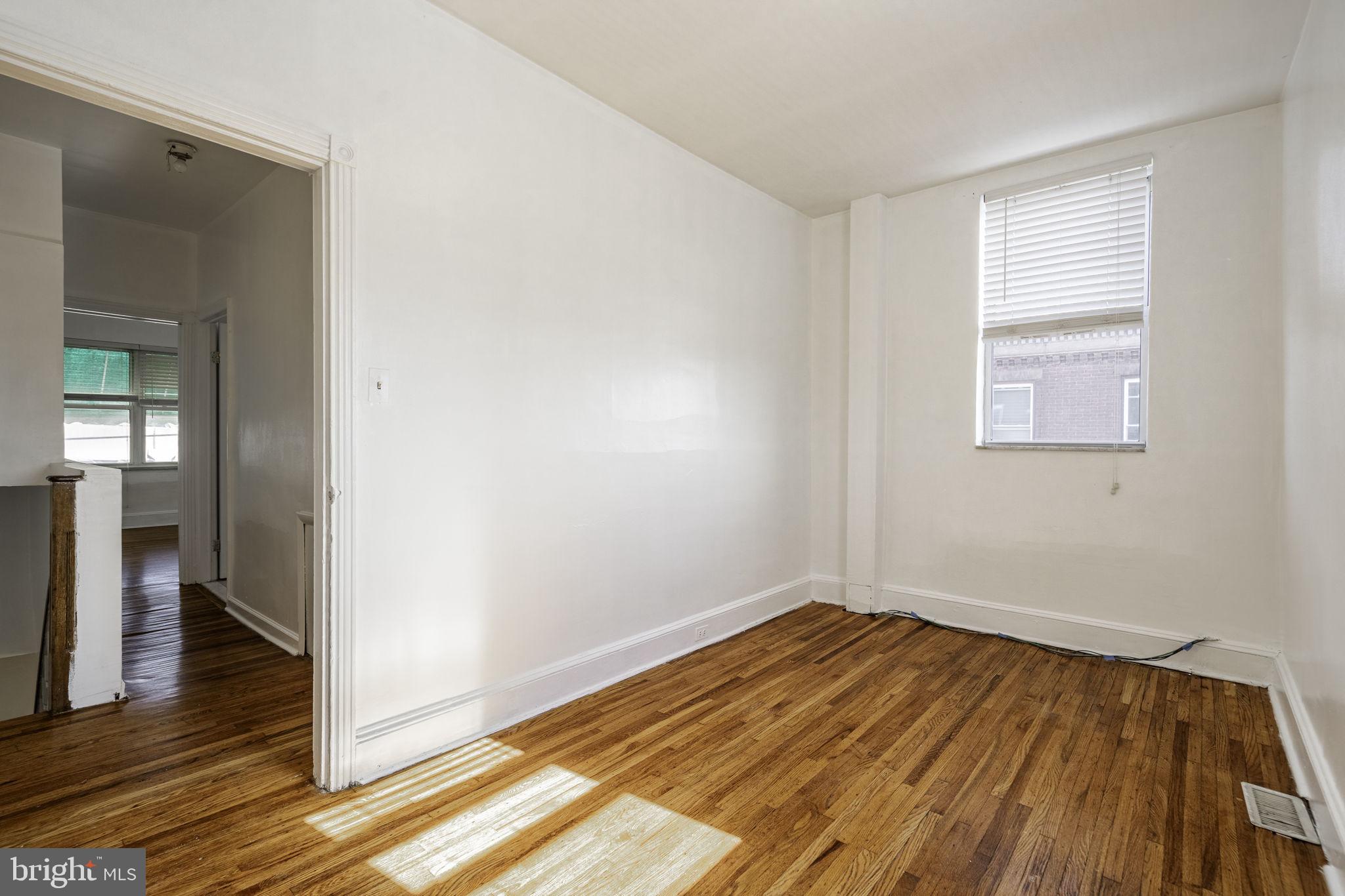 1314 West Ritner Street Philadelphia, PA 19148 - Photo 16 of 19 a view of a room with wooden floor and a window