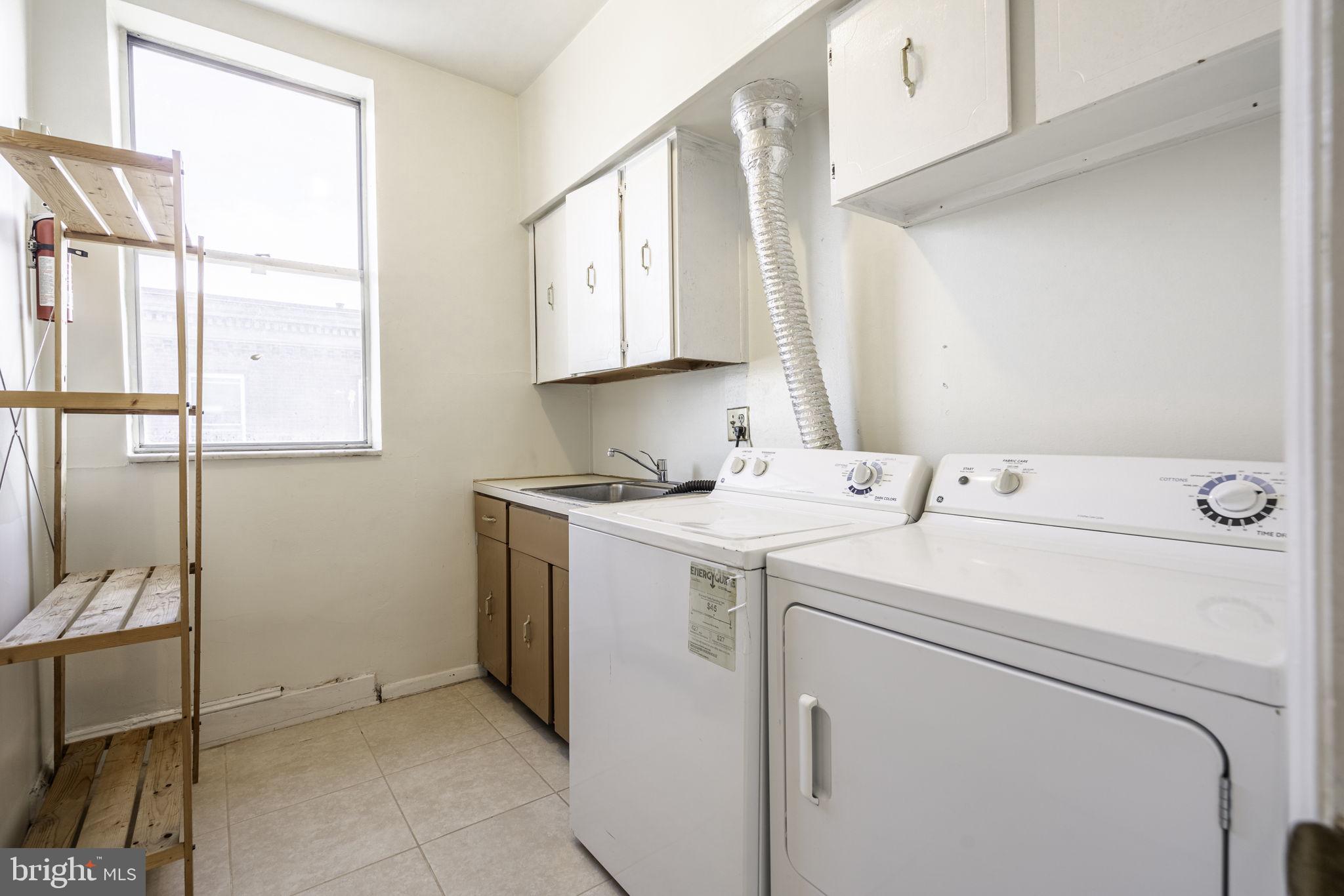 1314 West Ritner Street Philadelphia, PA 19148 - Photo 19 of 19 a utility room with dryer and washer