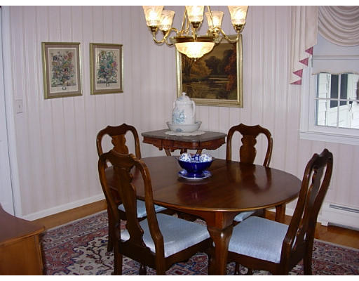 35 Blacksmith Road Wilbraham, MA 01095 - Photo 12 of 18 a view of a dining room with furniture and chandelier