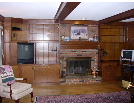 35 Blacksmith Road Wilbraham, MA 01095 - Photo 10 of 18 a living room with furniture and a fireplace