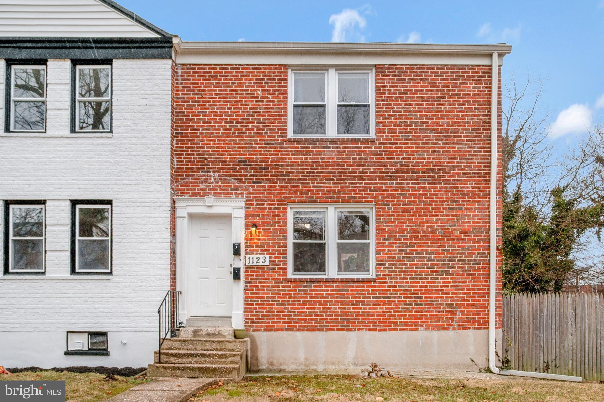 1123 Gleneagle Road Baltimore, MD 21239 - Photo 1 of 40 a front view of a house with a glass door