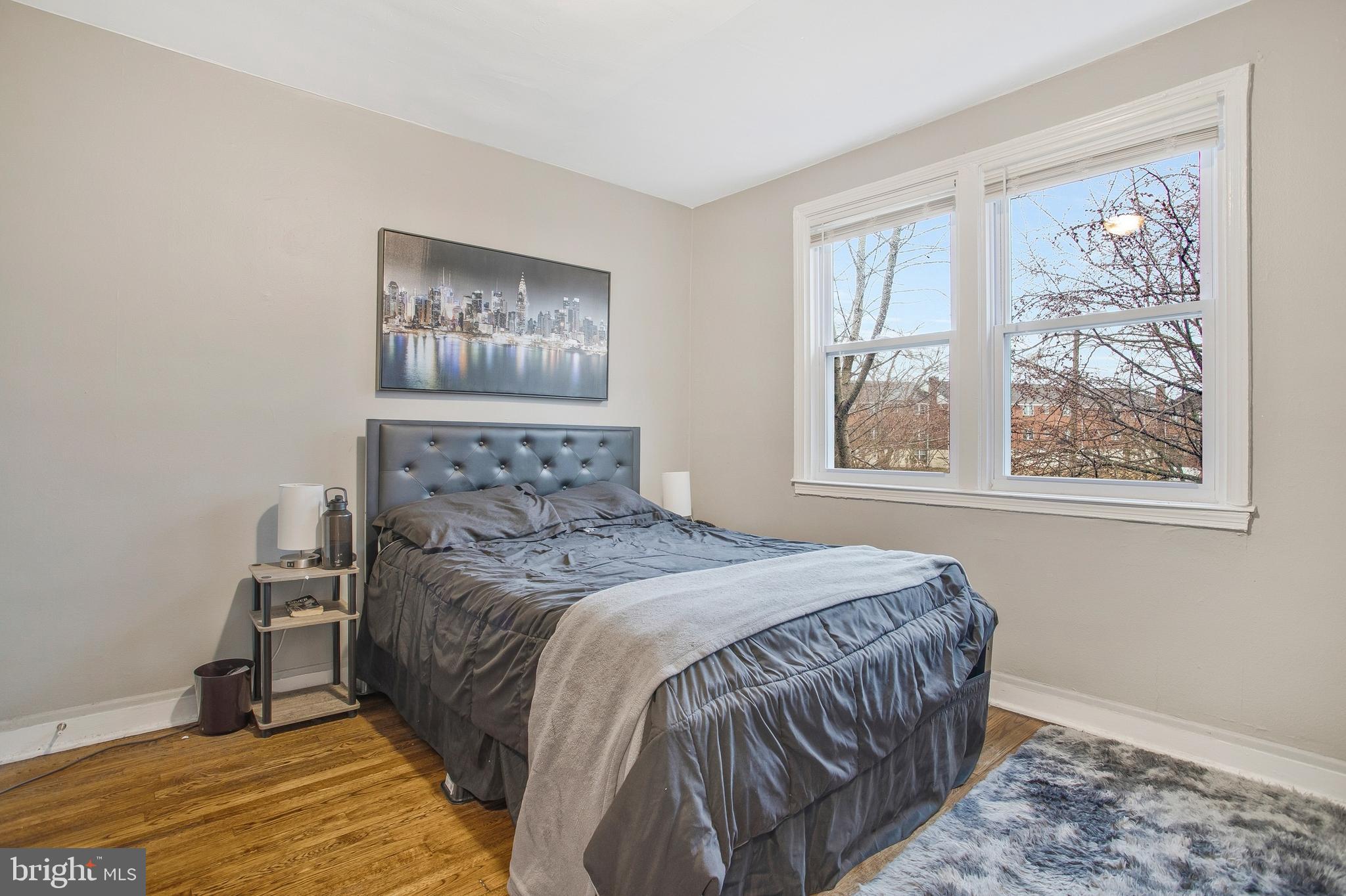 1123 Gleneagle Road Baltimore, MD 21239 - Photo 13 of 40 a bedroom with a bed and a window