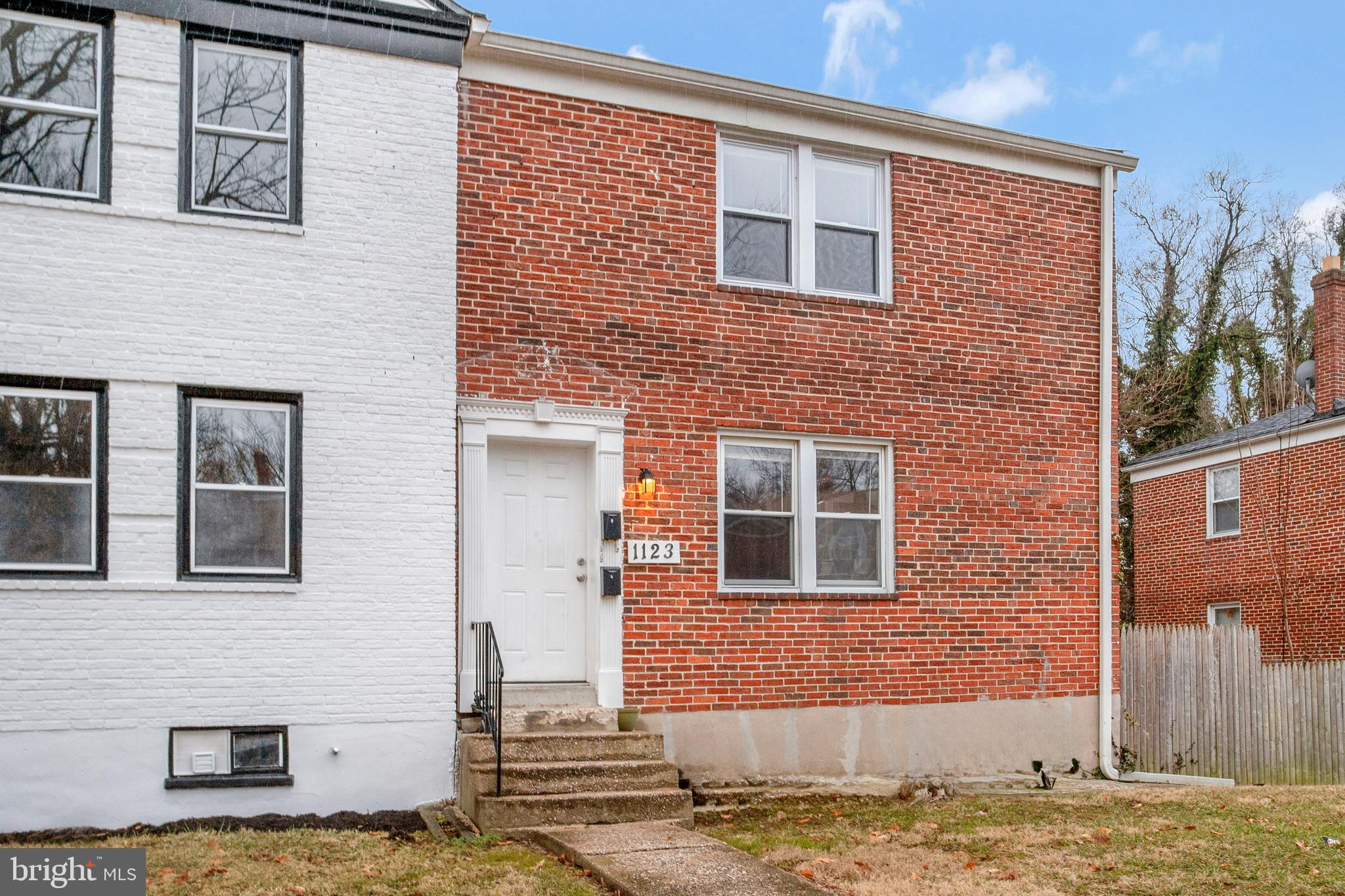 1123 Gleneagle Road Baltimore, MD 21239 - Photo 3 of 40 a brick house with a large windows