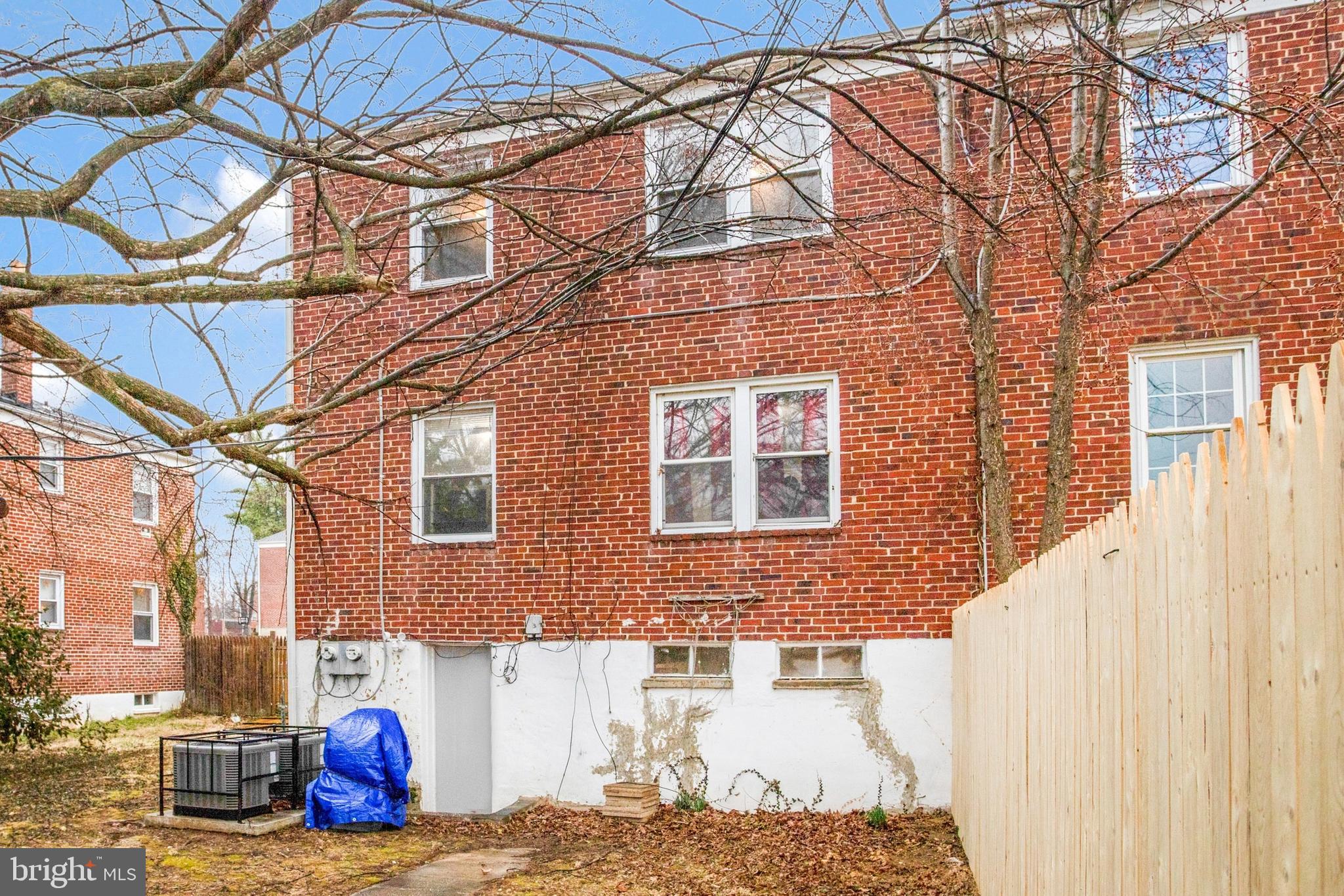 1123 Gleneagle Road Baltimore, MD 21239 - Photo 39 of 40 a front view of a building with large windows