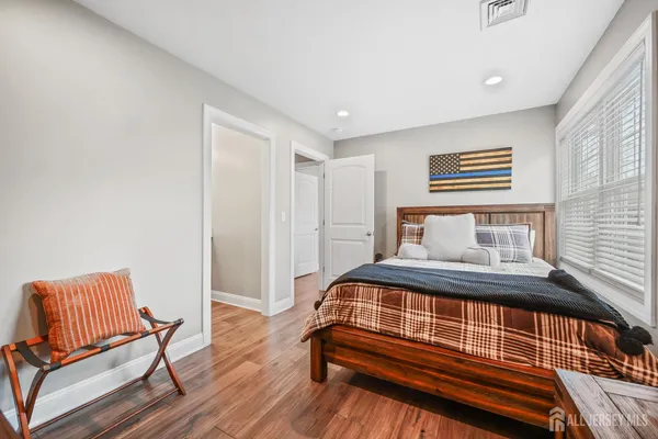 a bathroom with a toilet a sink and shower