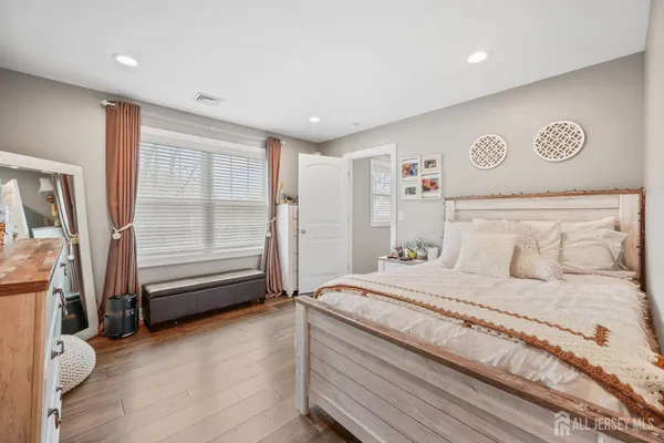 a front view of a house with a yard and porch