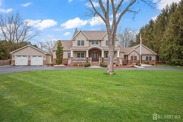 a view of a patio with chairs and plants