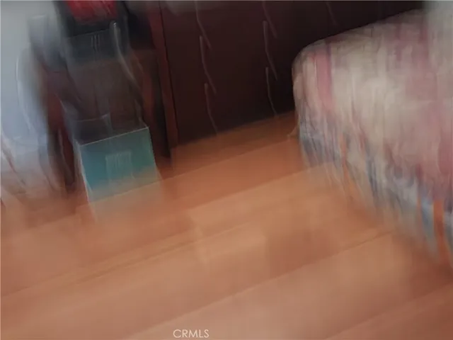 a view of outdoor space and wooden floor