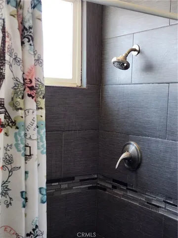 a bathroom with a sink and toilet