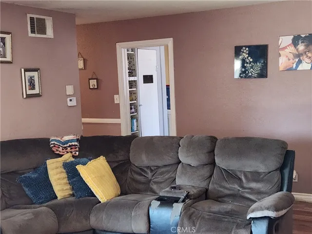 a living room with furniture and a couch