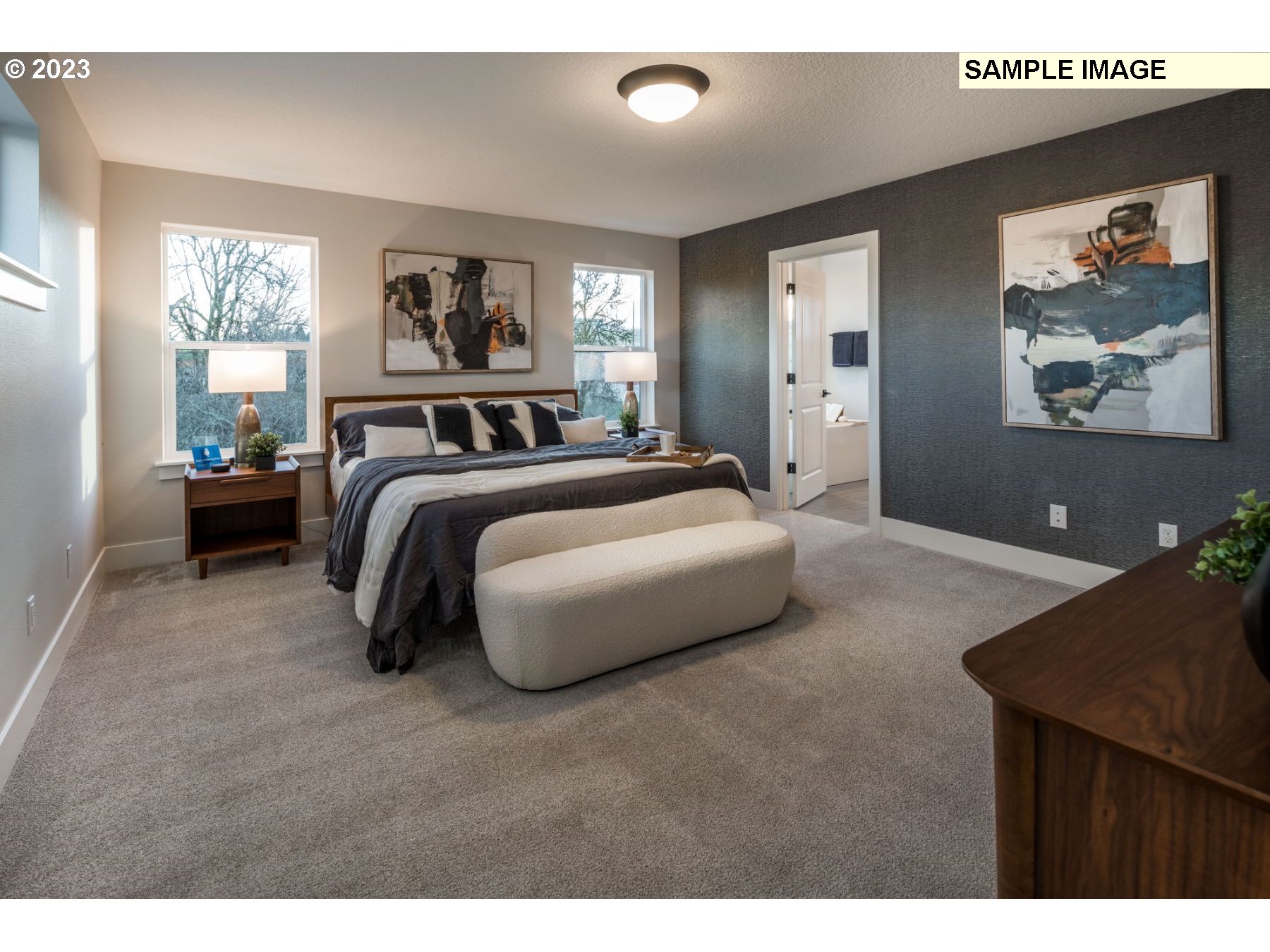935 Northwest 178th Street Ridgefield, WA 98642 - Photo 15 of 24 a spacious bedroom with a bed and window