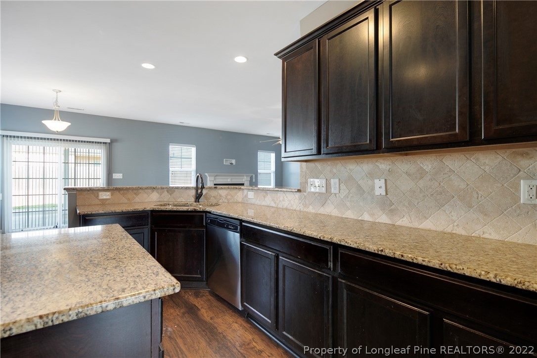 826 Harry Truman Road Fayetteville, NC 28311 - Photo 16 of 48 a kitchen with a sink and a cabinets