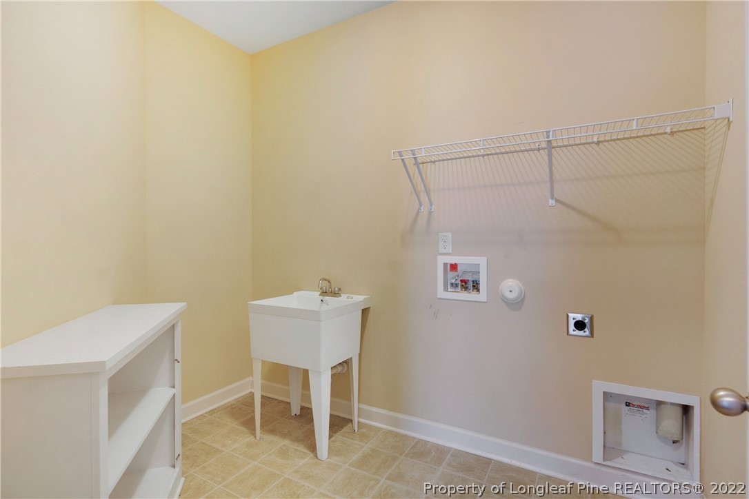 826 Harry Truman Road Fayetteville, NC 28311 - Photo 19 of 48 a room with a table and chairs