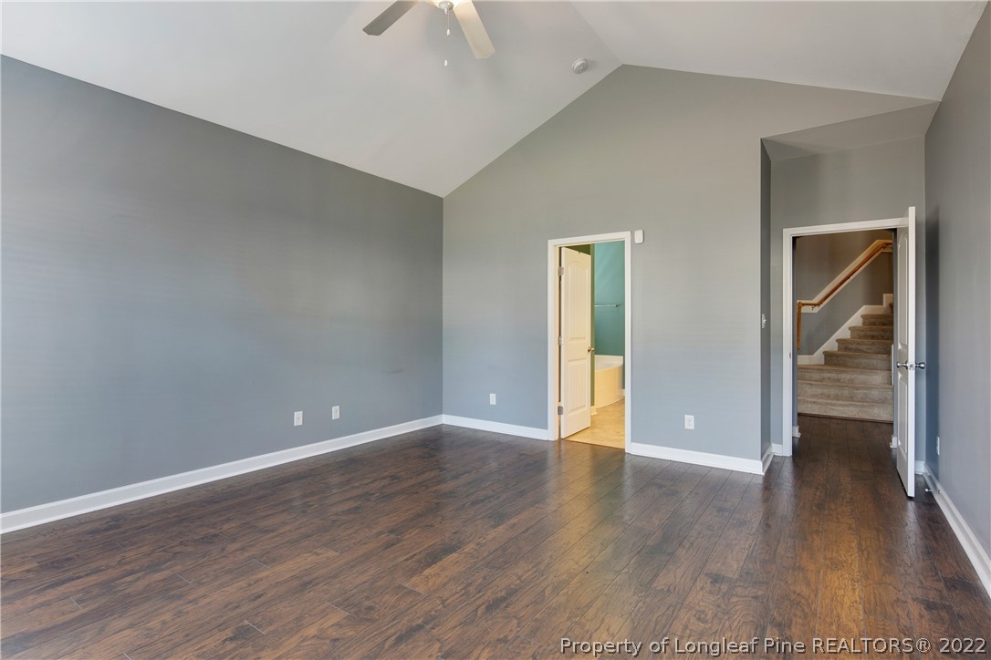 826 Harry Truman Road Fayetteville, NC 28311 - Photo 22 of 48 a view of an empty room with wooden floor