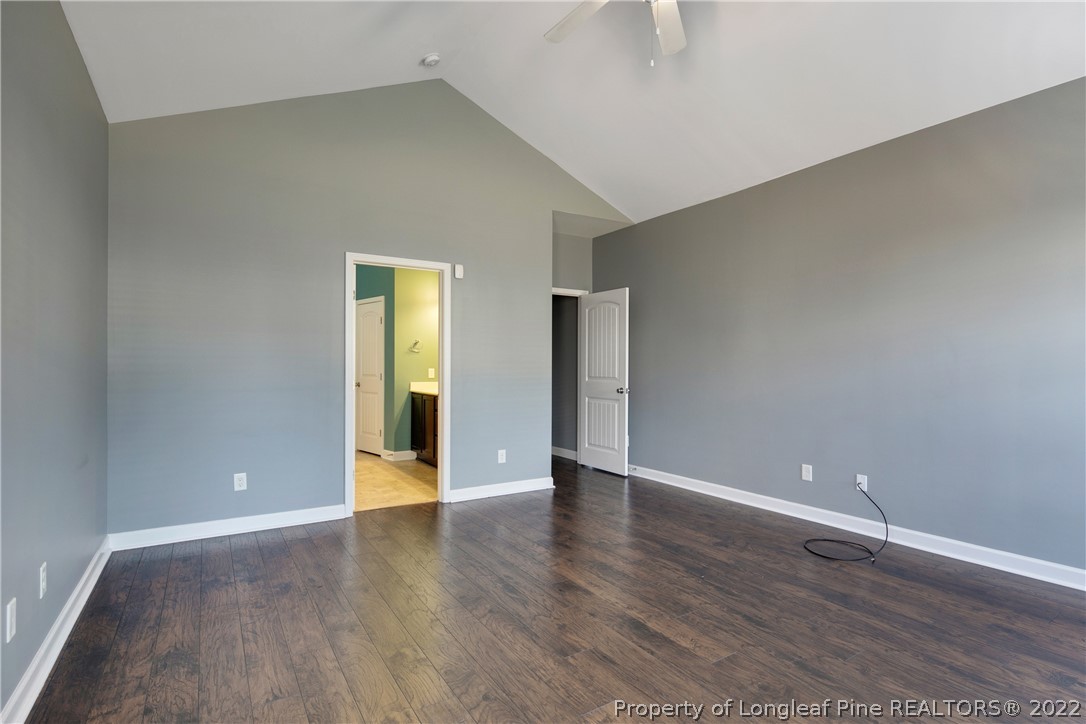 826 Harry Truman Road Fayetteville, NC 28311 - Photo 23 of 48 a view of an empty room with wooden floor