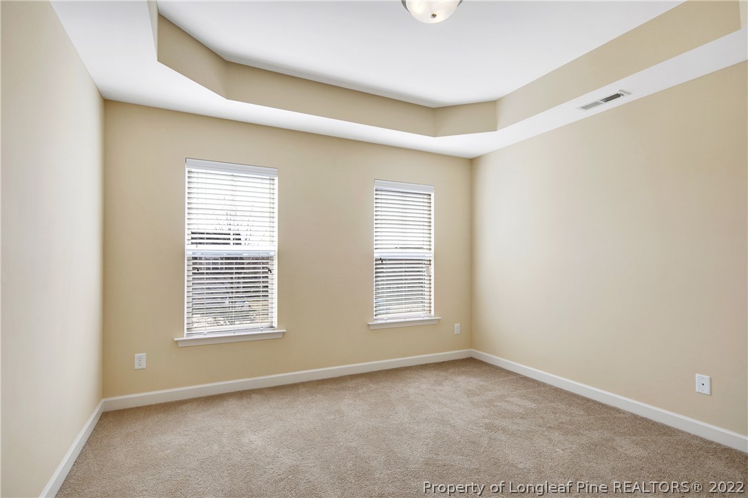 826 Harry Truman Road Fayetteville, NC 28311 - Photo 36 of 48 an empty room with windows