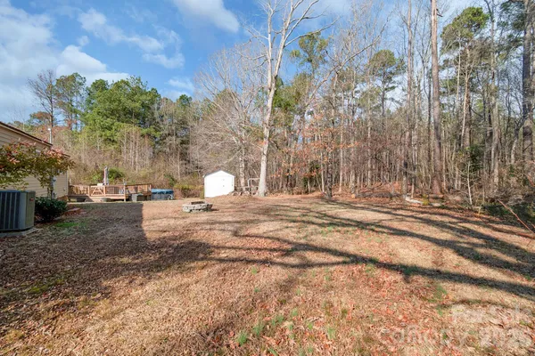 a view of a backyard of a house