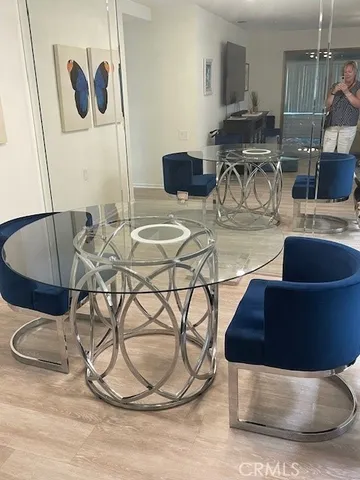 a bedroom with a bed and a lamp with window