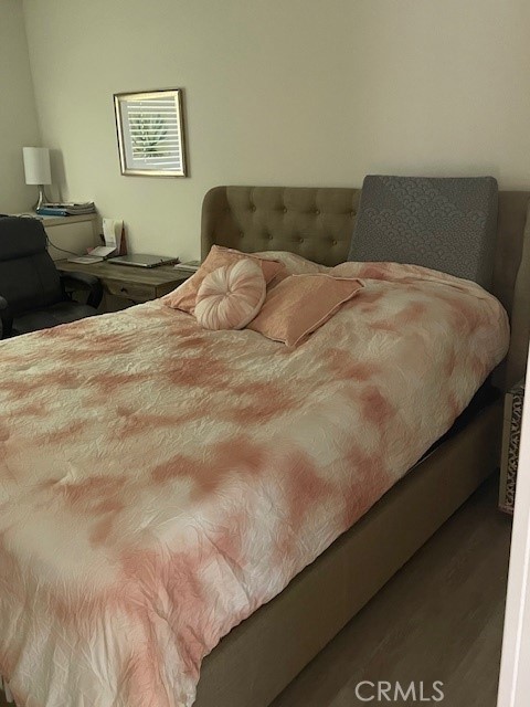 852 Ronda Mendoza, Unit Q Laguna Woods, CA 92637 - Photo 7 of 20 a bed sitting in a bedroom with a lamp