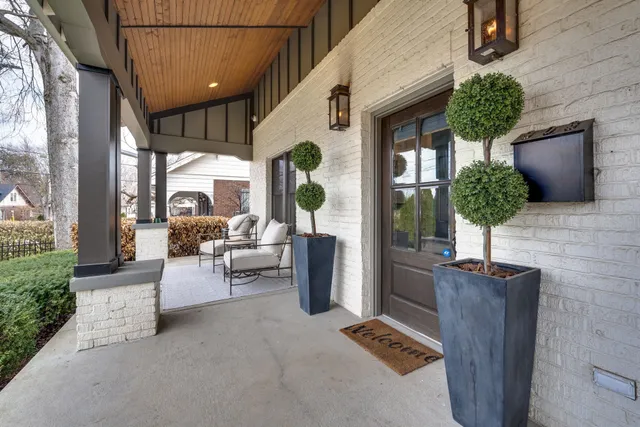 a outdoor space with a couch and chairs