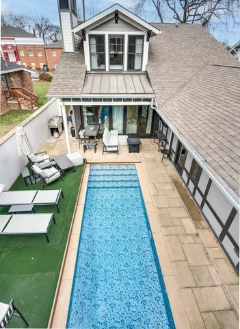 a view of a house with swimming pool