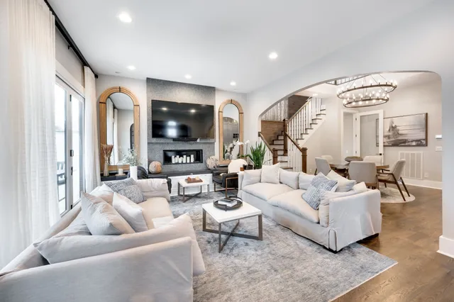 a kitchen with a stove a refrigerator and a sink