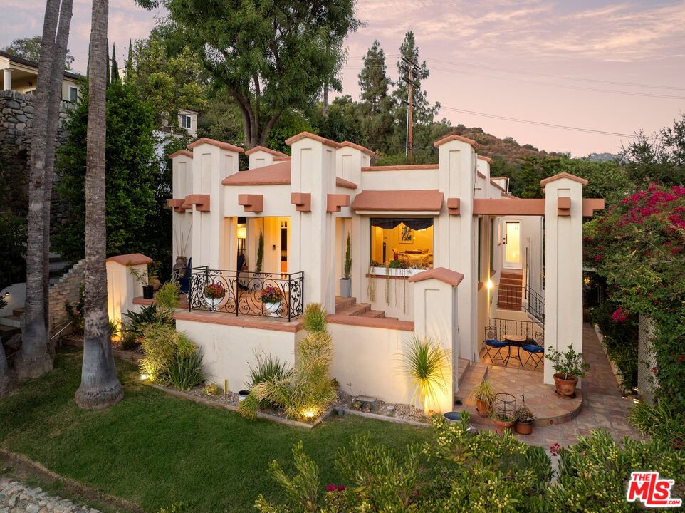 680 Glenmore Boulevard Glendale, CA 91206 - Photo 1 of 15 a view of a house with outdoor space and sitting area