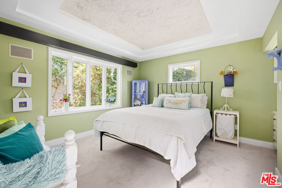 680 Glenmore Boulevard Glendale, CA 91206 - Photo 12 of 15 a bed room with a bed and a couch