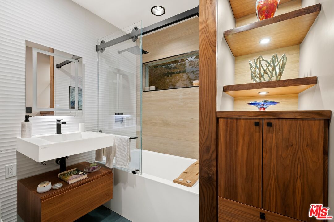 680 Glenmore Boulevard Glendale, CA 91206 - Photo 13 of 15 a bathroom with a sink and a mirror