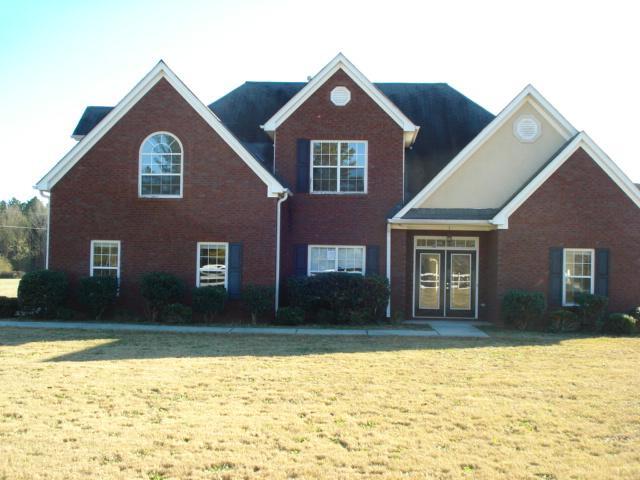 14208 Woolsey Road, Unit 13 Hampton, GA 30228 - Photo 1 of 1 FRONT