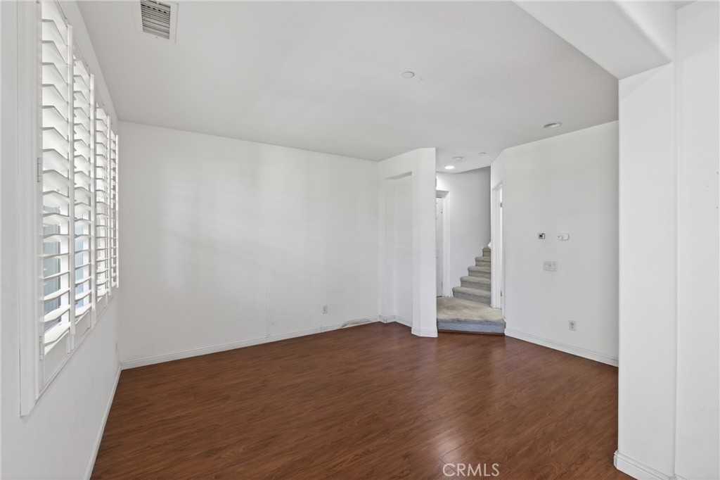 3924 Polk Street, Unit E Riverside, CA 92505 - Photo 2 of 22 wooden floor in an empty room