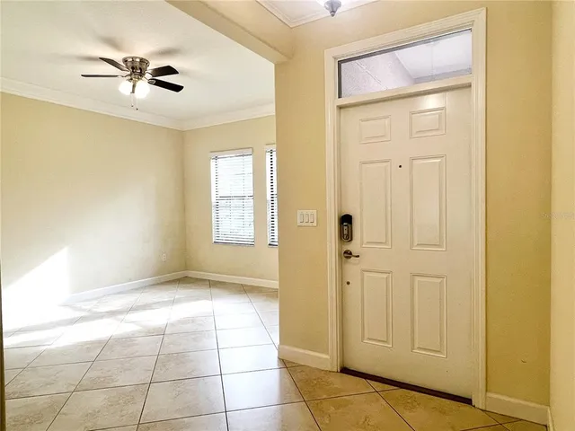 a view of an entryway with a chandelier