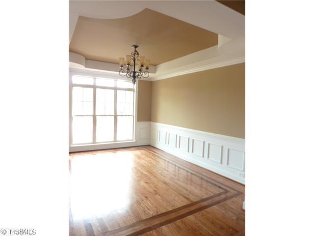 5036 Peppertree Road Clemmons, NC 27012 - Photo 3 of 16 Dining Room. Beautiful hardwood floors, picture molding, and trey ceiling