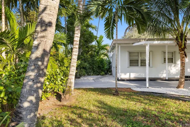 a view of a house with swimming pool