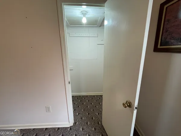 a front view of a house with garage