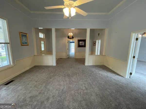 a workspace with furniture and a window