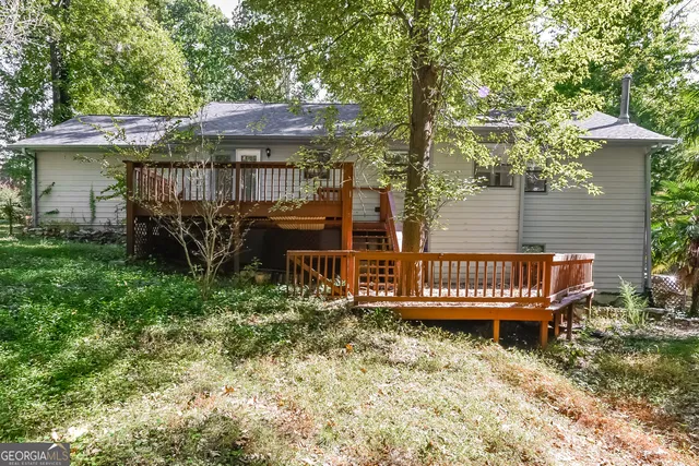 a picture of a bench and a sign