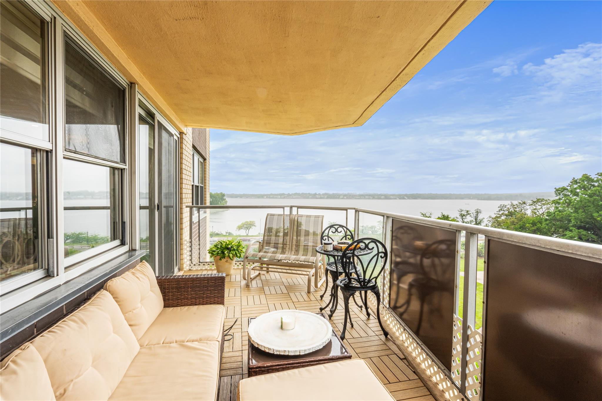 17-85 215th Street, Unit 4M Queens, NY 11360 - Photo 1 of 41 Balcony with a water view and an outdoor living space