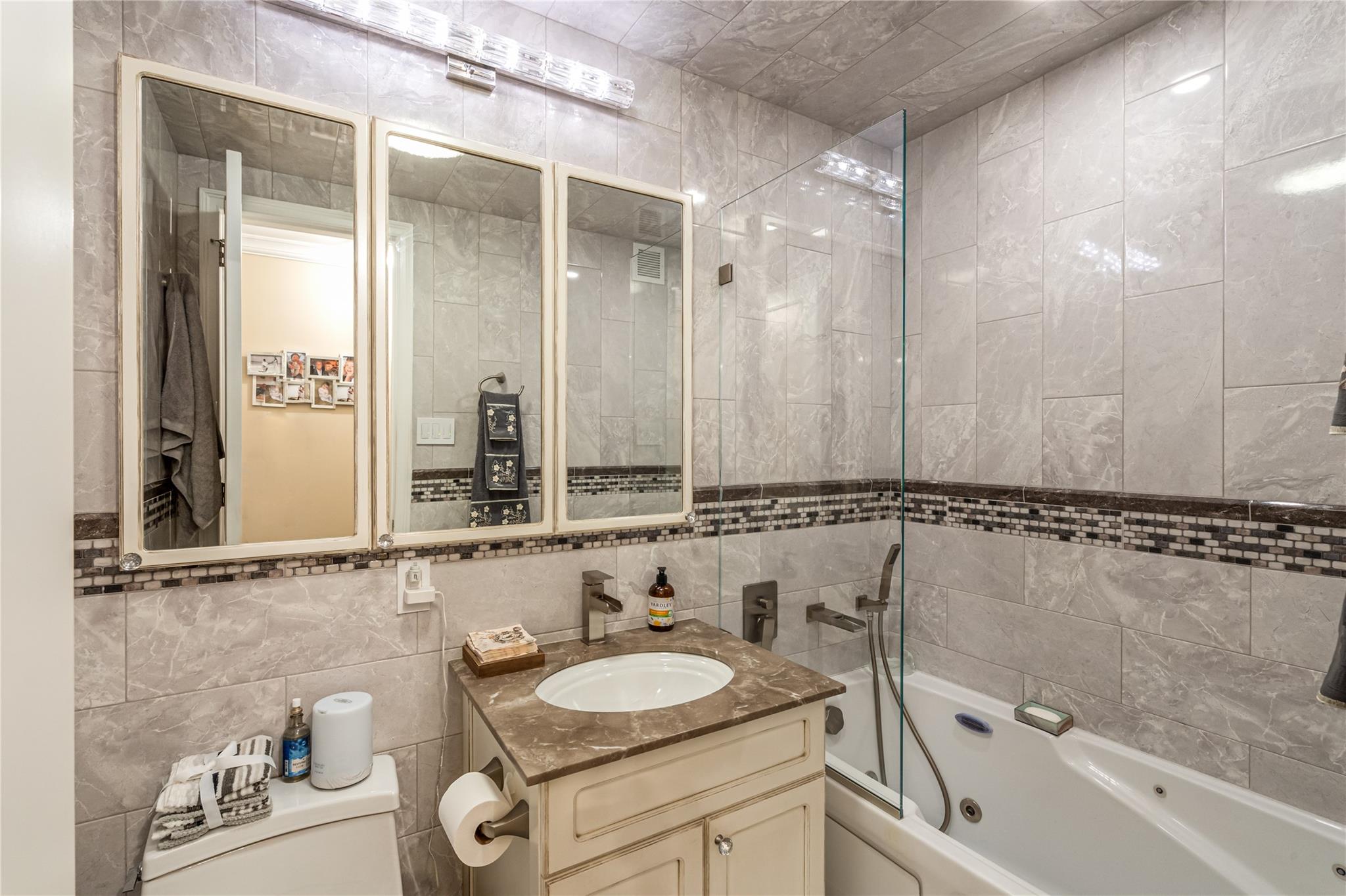 17-85 215th Street, Unit 4M Queens, NY 11360 - Photo 22 of 41 Full Bathroom