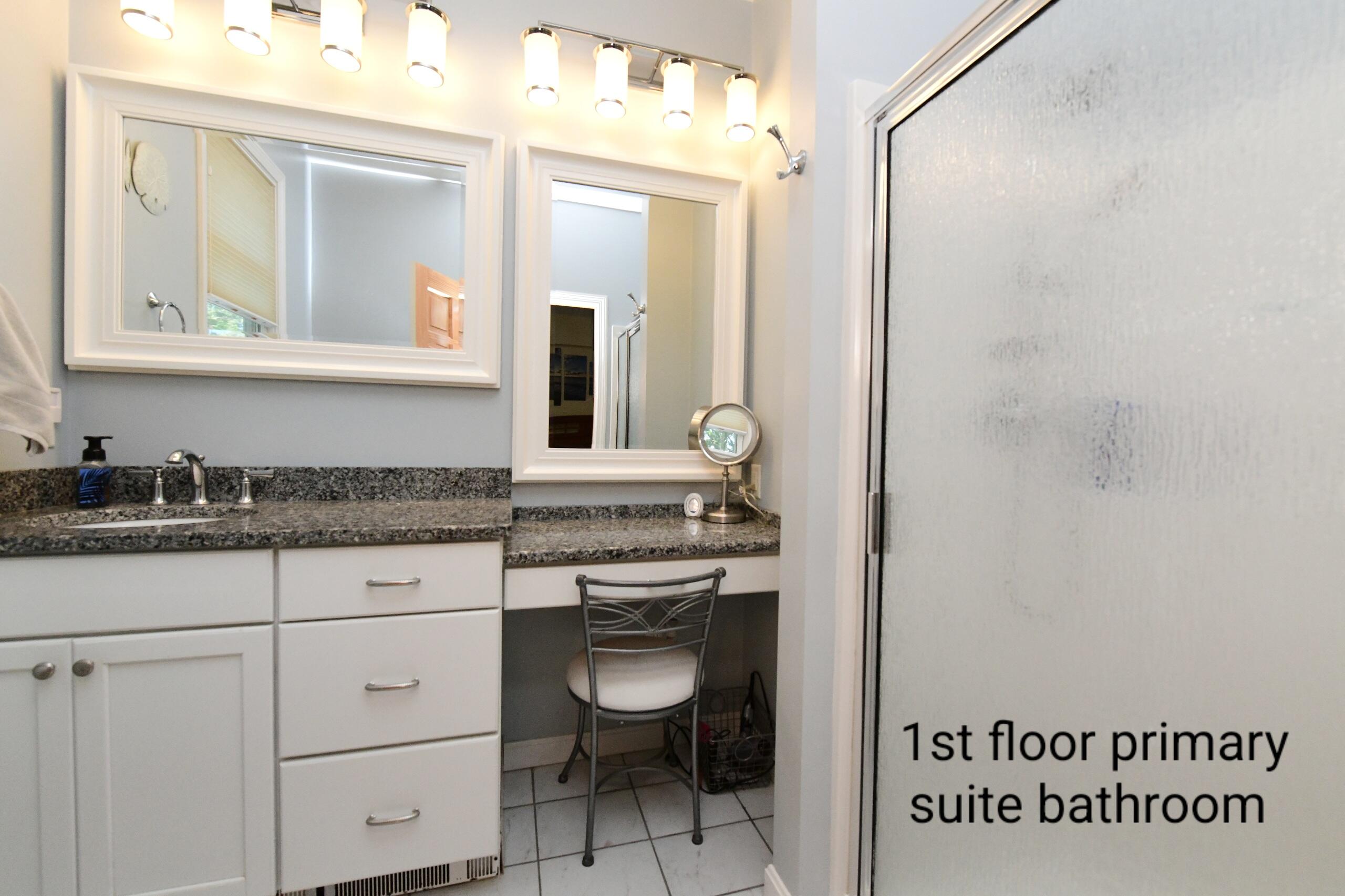 173 Standish Road Sagamore Beach, MA 02562 - Photo 13 of 39 a bathroom with a granite countertop sink and a mirror