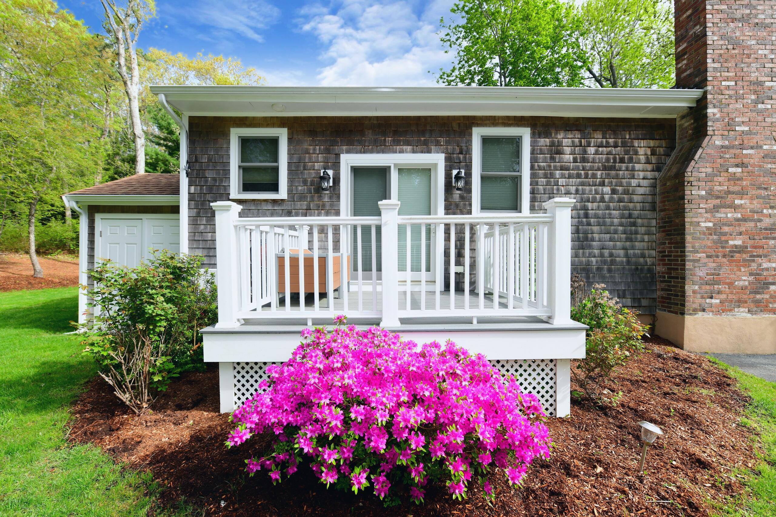173 Standish Road Sagamore Beach, MA 02562 - Photo 14 of 39 a view of a house with a yard